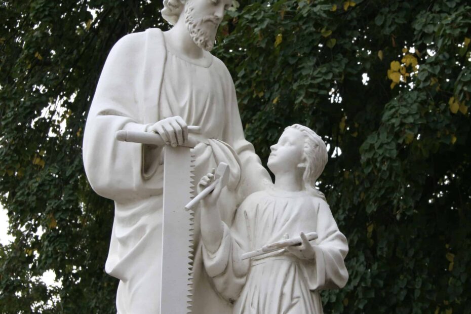 A statue depicting St. Joseph and a young Jesus.