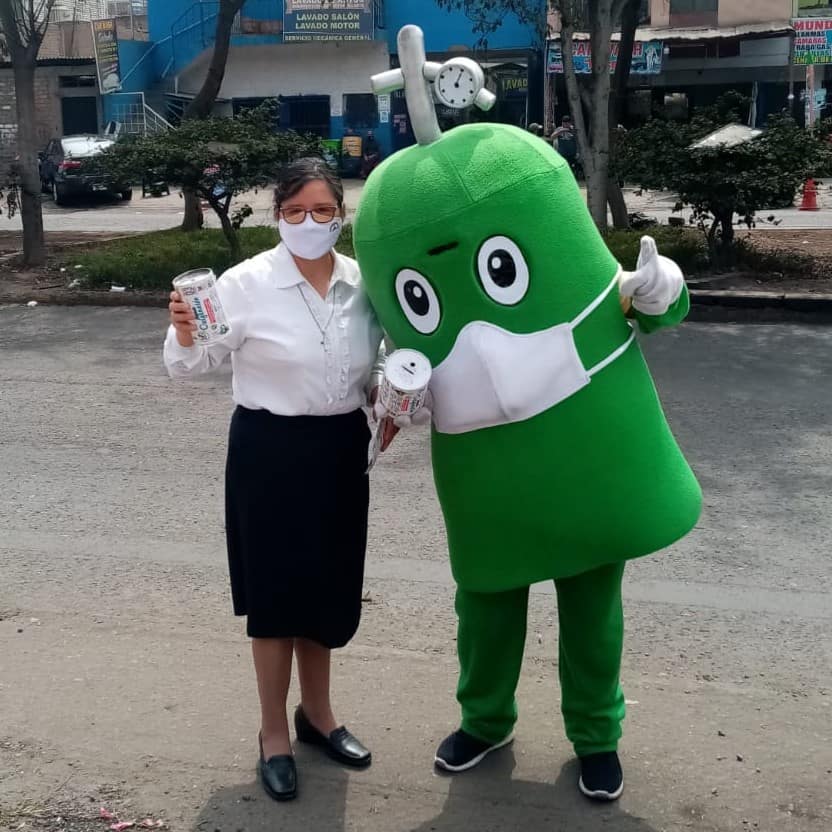 Sister Yolanda raises money with the mascot for the Respira y Vive campaign