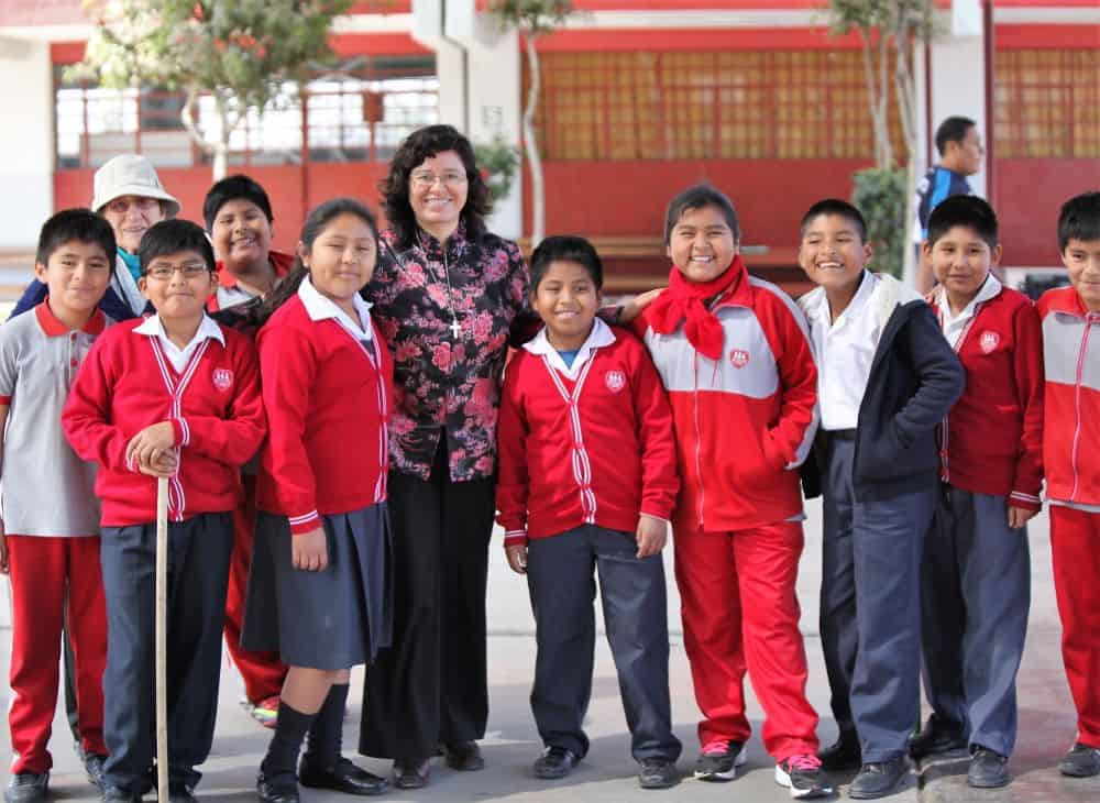 Sister Yolanda with students in Peru