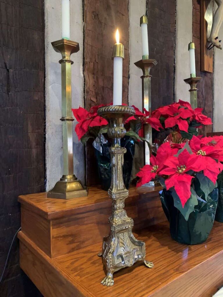 A decorative candle stand from the Holy Family Log Church