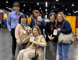 Five women and a man representing the Los Angeles Japanese Catholic community at the Religious Education Congress pose for a group photo