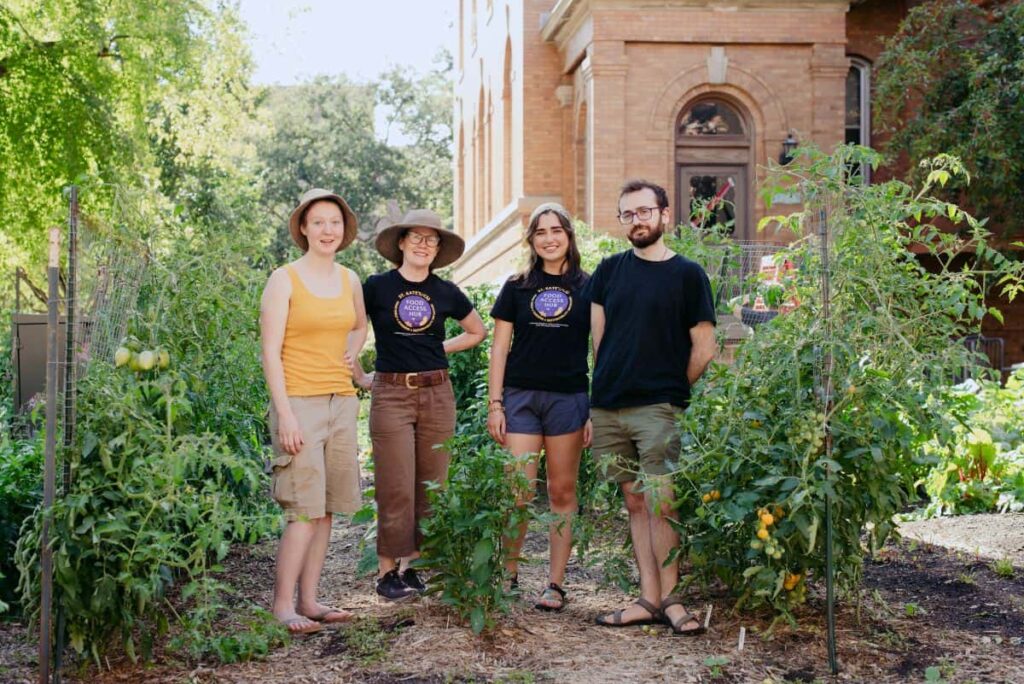 Food Access Hub team members taking a group photo in the Carondelet Community Garden