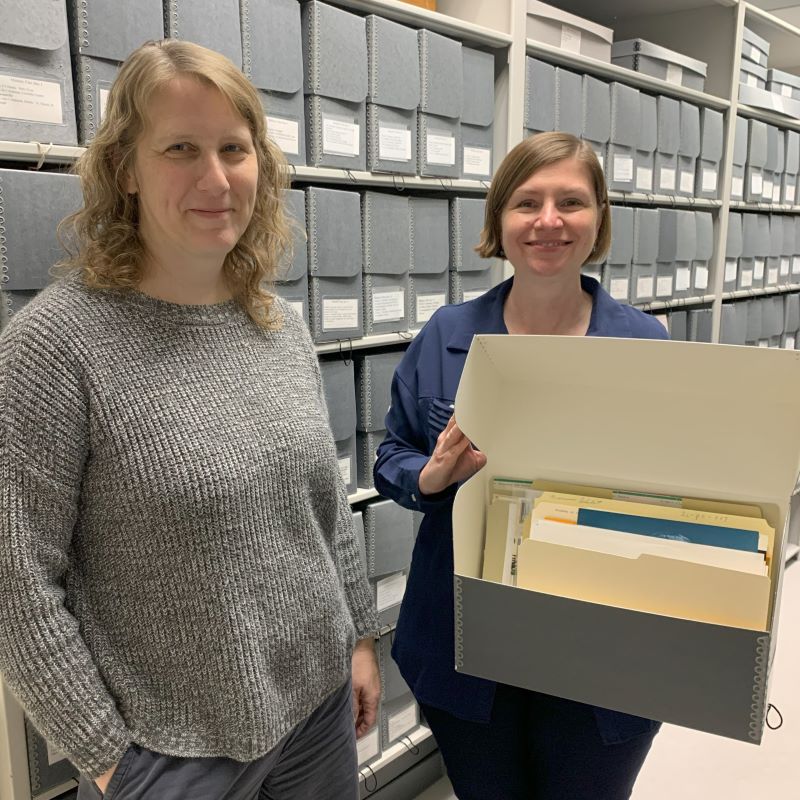 Sally Budge (left) and Catherine Lucy (right) standing together in the Carondelet Consolidated Archives