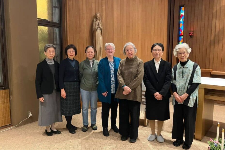 A group of seven sisters--six Japanese and one American--post together in the wood-paneled chapel in Japan