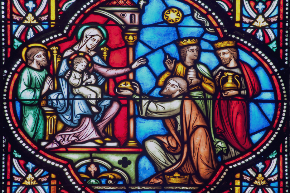 The adoration of the Magi depicted in stained glass in the St. Michael and St. Gudula Cathedral in Brussels, Belgium.