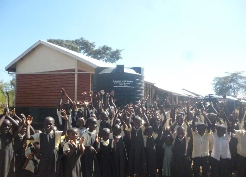 Lwala girls full of joy at their new clean water tank