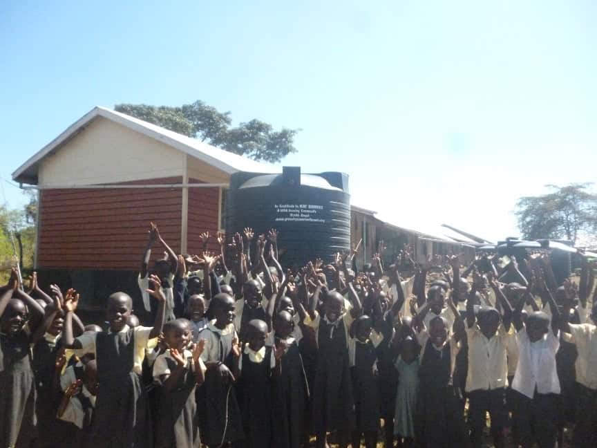 Lwala girls full of joy at their new clean water tank
