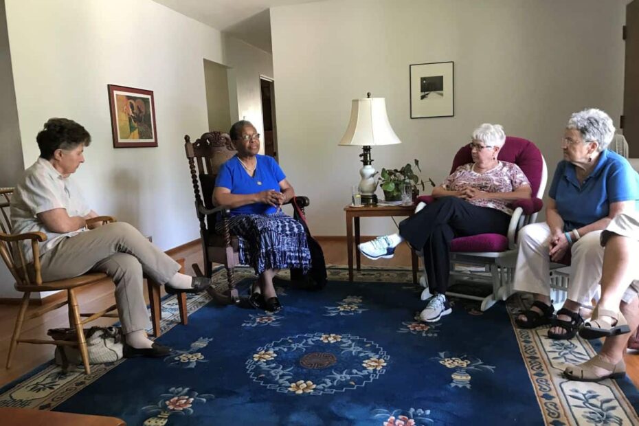 Sisters gathered in a circle to share
