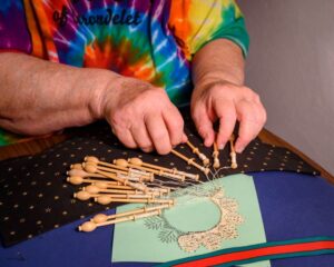 Close up of Sister Nancy Marsh's hands lacemaking